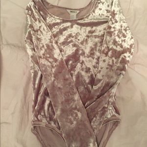 It is a velvet body suit